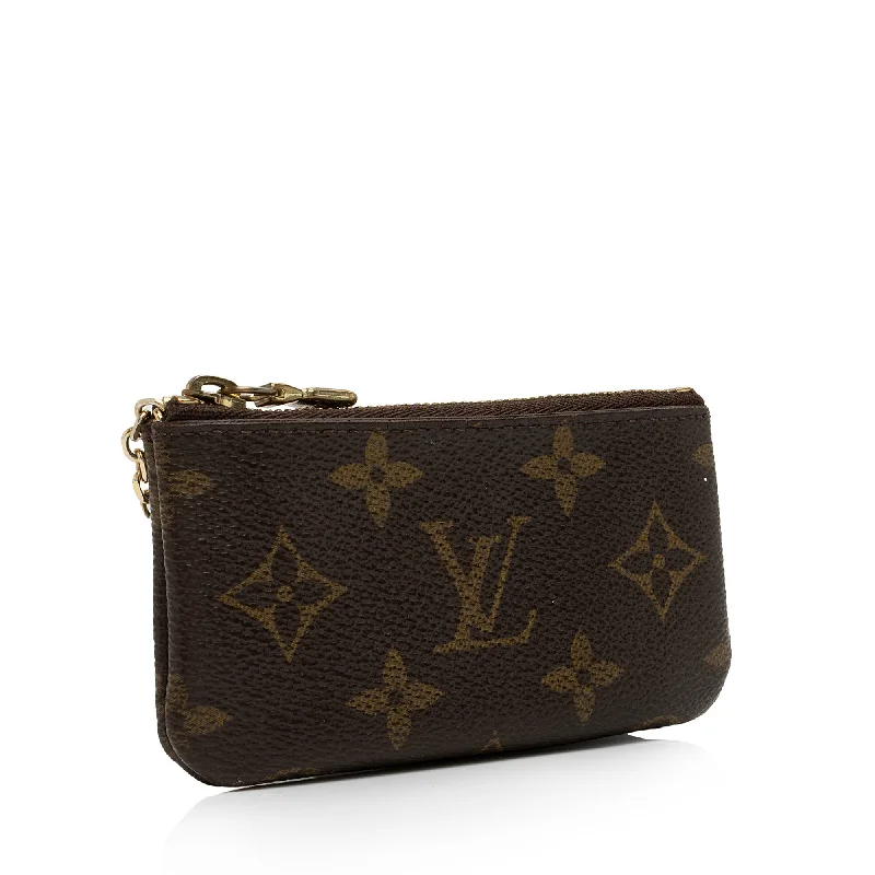 Louis Vuitton bags with a snap - button closure and a decorative charm for styleLouis Vuitton Monogram Canvas Key Pouch (SHF-lwo6sC)