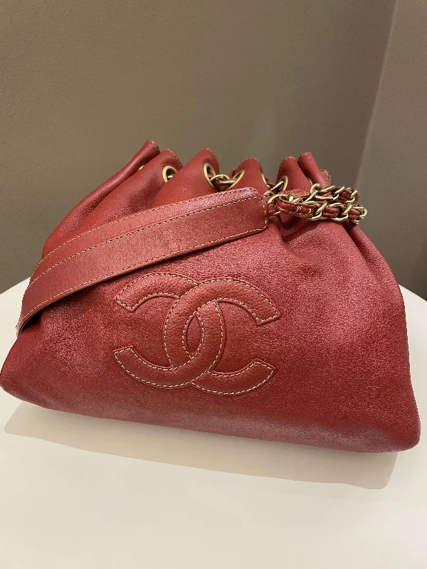 Chanel Quilted Leather Shoulder Bag for FashionistasChanel Vintage Cc Drawstring Bucket Burned Red Calfskin